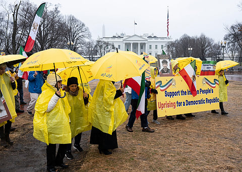 Demonstrators gather at Lafayette Park in front of the White House to protest the Iranian government during the "Free Iran" rally on January 10, 2026 in Washington, DC. 