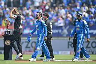 India's Virat Kohli (L) and Rohit Sharma.