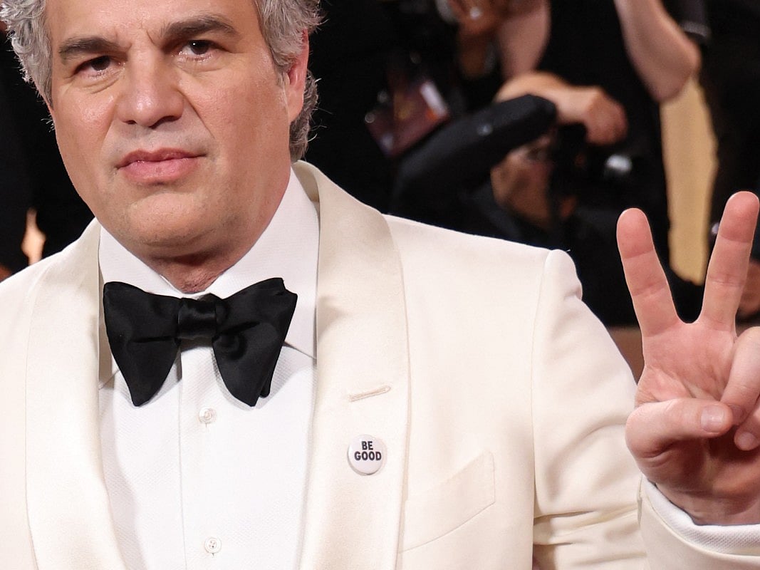US actor Mark Ruffalo US wears a pin reading "be Good", in tribute to Renee Good, who was fatally shot by a US Immigration and Customs Enforcement (ICE) agent in Minneapolis, as she attends the 83rd annual Golden Globe Awards at the Beverly Hilton hotel in Beverly Hills, California, on January 11, 2026.