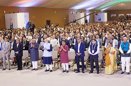 Prime Minister Narendra Modi at the inauguration of the Vibrant Gujarat Regional Conference for the Kutch and Saurashtra region, as Gujarat Chief Minister Bhupendra Patel, Deputy Chief Minister Harsh Sanghavi, and Reliance Industries Chairman Mukesh Ambani look on in Rajkot, Gujarat, Sunday, January 11, 2026. 