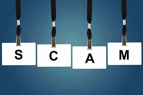 Two scammers trick woman and drain Dh40,900 from her bank account