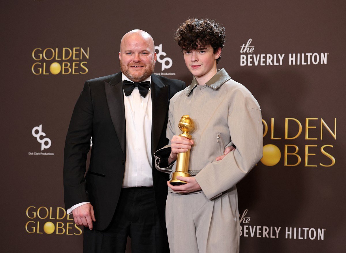 Andy Cooper (left) and Owen Cooper, winner of the Best Performance by a Male Actor in a Supporting Role on Television Award for "Adolescence" poses in the press room during the 83rd Annual Golden Globe Awards at The Beverly Hilton on January 11, 2026 in Beverly Hills, California.