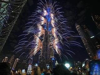 Fireworks explode around the Burj Khalifa, the world's tallest building, during New Year's Eve celebrations in Dubai, on Thursday, January 1, 2026. 