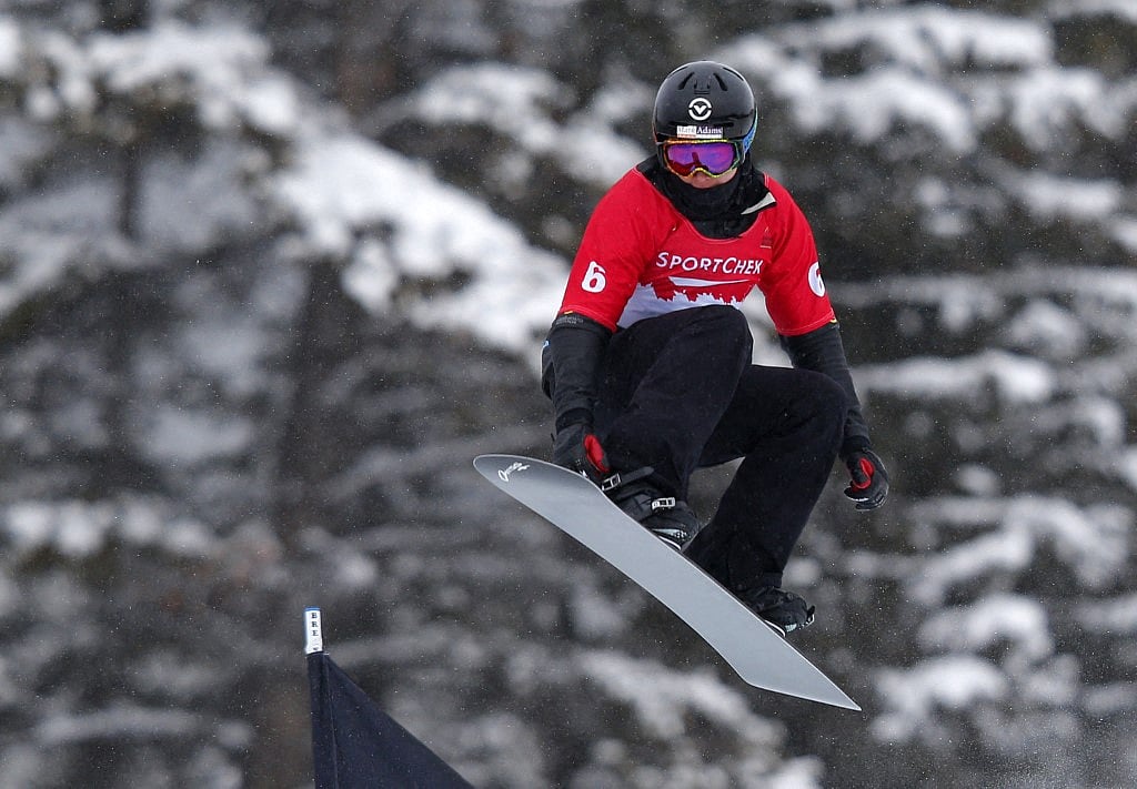 Belle Brockhoff of Australia takes to the air during the women's qualification run at the FIS Snowboard Cross World Cup December 20, 2013 in Lake Louise, Alberta, Canada.