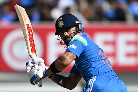 India's Virat Kohli plays a shot during the second one-day international (ODI) cricket match between India and New Zealand at Niranjan Shah Stadium in Rajkot on January 14, 2026.
