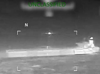 This screen grab from a video posted on the X account of US Southern Command (SOUTHCOM) on January 15, 2026, shows what the US military says is a pre-dawn January 15 action to apprehend the Tanker Veronica in the Carribean Sea.