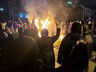 Iranians attend an anti-government protest in Tehran, Iran. 