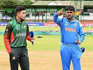 India Under-19 skipper Ayush Mhatre (right) and Bangladesh vice-captain Zawad Abrar, are seen during the toss at the Queens Sports Club in Bulawayo.