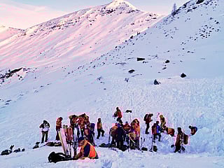 In this photo provided by the Bergrettung Pongau (Mountain Rescue Pongau), rescuers search for people after an avalanche in the Salzburg Pongau region of western Austria, Saturday, Jan. 17, 2026.