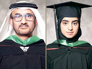 Mansour Ahmed Mansour and his daughter Aisha.