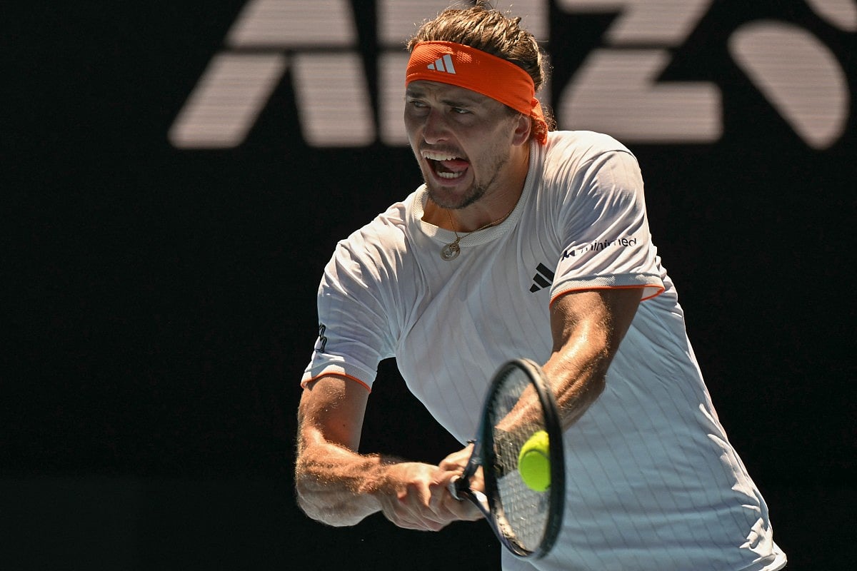 Germany's Alexander Zverev hits a return to Canada's Gabriel Diallo during their men's singles match on day one of the Australian Open tennis tournament in Melbourne on January 18, 2026.