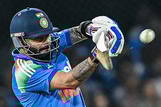 India's Virat Kohli plays a shot during the third one-day international (ODI) cricket match between India and New Zealand at the Holkar Cricket Stadium in Indore on January 18, 2026.