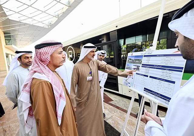 Ahmed Hashem Bahrozyan briefing Mattar Al Tayer on the expansion of Dubai's public transport plan.