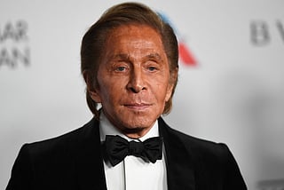 Italian fashion designer Valentino Garavani poses on the red carpet upon arrival to attend the British Fashion Awards 2018 in London on December 10, 2018.