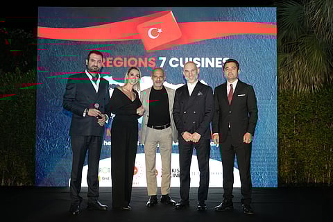 Consul General of Türkiye in Dubai Onur Şaylan (right) with guest during the Mediterranean Cuisine Night event hosted by him in Dubai