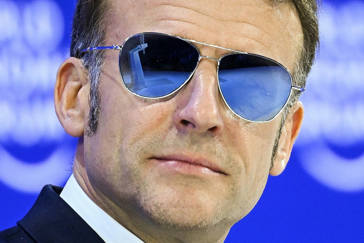 France's President Emmanuel Macron wearing sunglasses