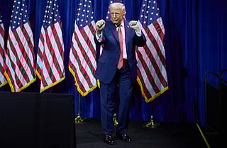 President Donald Trump dances as he walks off stage after speaking to House Republican lawmakers during their annual policy retreat, Tuesday, Jan. 6, 2026, in Washington.