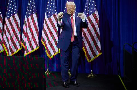 President Donald Trump dances as he walks off stage after speaking to House Republican lawmakers during their annual policy retreat, Tuesday, Jan. 6, 2026, in Washington.