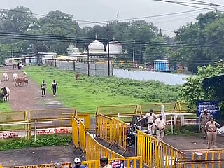 Police personnel stand guard outside the Bhojshala in Madhya Pradesh.