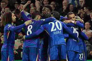 Chelsea players celebrate after scoring during the Champions League