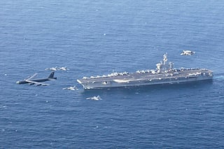 The USS Abraham Lincoln carrier and a US Air Force B-52H Stratofortress, conduct joint exercises in the US Central Command area of responsibility in Arabian Sea June 1, 2019. 