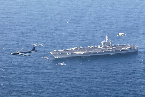 The USS Abraham Lincoln carrier and a US Air Force B-52H Stratofortress, conduct joint exercises in the US Central Command area of responsibility in Arabian Sea June 1, 2019. 
