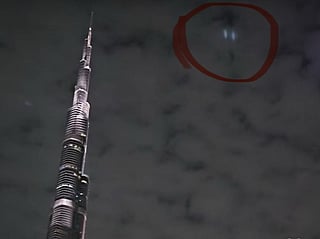 A screengrab from an Instagram video shows the mysterious green lights illuminating the sky near Burj Khalifa.