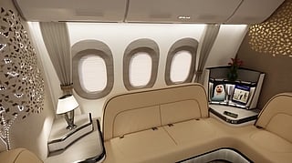 A brief CGI clip in an Emirates YouTube tribute to Sir Tim Clark appears to show the airline’s future Boeing 777X cabin, featuring business class suites with doors and a lounge-style seating area.