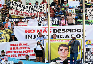 Salvadoran activists take part in a protest against President Nayib Bukele's policies -including the state of emergency, within the anti-gang crackdown, in force since March 2022 and which allows arrests without a warrant- in San Salvador, on January 25, 2026.