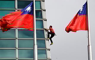 Rock climber Alex Honnold, of the U.S., performs a free solo climb of the Taipei 101 skyscraper in Taipei, Taiwan, Sunday, Jan. 25. 2026. 