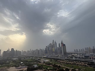 Rain clouds hover above the Dubai skyline 
