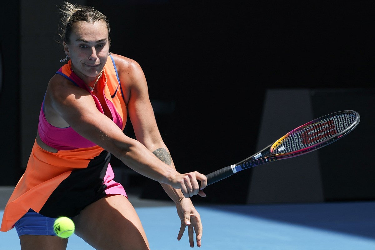 Belarus' Aryna Sabalenka hits a return against Canada's Victoria Mboko.