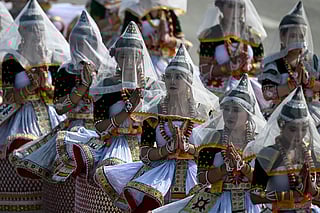Manipuri dancers perform during India's 77th Republic Day parade at Kartavya Path in New Delhi on January 26, 2026.