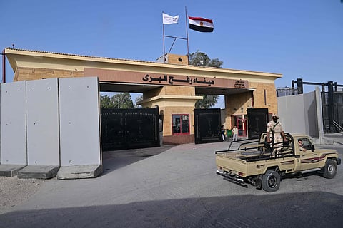 Egyptian army soldiers guard their side of the Rafah crossing, closed since early May, on July 4, 2024.