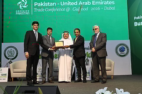 Dr Mohammed Saeed Al Kindi, former UAE Minister of Water and Environment receiving shield from Hussain Muhammed; Ali Khan and Athar Hussain Khokhar at the event in Dubai