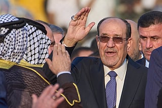 FILE - Former Iraqi Prime Minister Nouri al-Maliki arrives to his political block campaign rally before the parliamentary elections in Baghdad, Iraq, Friday, Nov. 7, 2025. (AP Photo/Hadi Mizban, File)