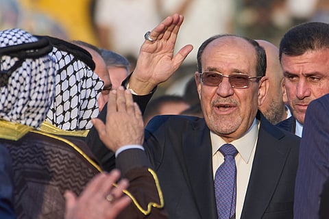 FILE - Former Iraqi Prime Minister Nouri al-Maliki arrives to his political block campaign rally before the parliamentary elections in Baghdad, Iraq, Friday, Nov. 7, 2025. (AP Photo/Hadi Mizban, File)