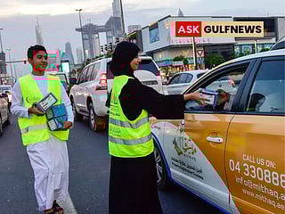 Volunteers distributing Iftar meals to motorists at a Ramadan initiative by from Al Ihsan Charity Association at a traffic signal near City Walk in Dubai (Picture used for illustrative purposes)