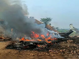 The aircraft appeared to lose control seconds before touching down, plunging nearly 100 feet short of the runway before crashing and erupting into flames.