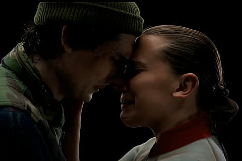 Finn Wolfhard and Millie Bobby-Brown as Mike Wheeler and Eleven in Stranger Things. 