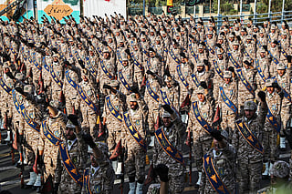 This handout file picture provided by the Iranian presidency on September 22, 2019 shows members of Iran's Islamic Revolutionary Guard Corps (IRGC) giving a military salute during a military parade in Tehran.