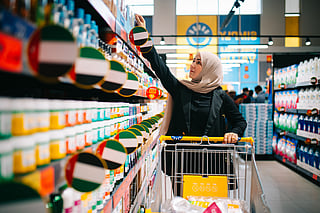 A shopper browses the aisles at a Sava discount store in the UAE.