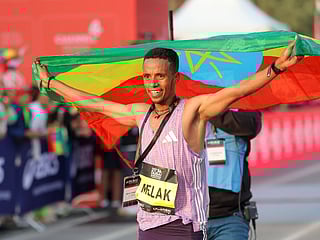 Nibret Melak from Ethiopia wins the 25th anniversary edition of the Dubai marathon. 