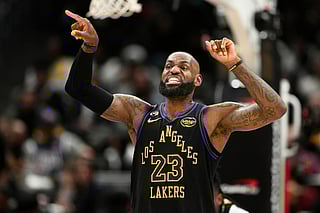 Los Angeles Lakers forward LeBron James gestures during the first half of an NBA basketball game against the Washington Wizards, Friday, Jan. 30, 2026, in Washington. (AP Photo/Nick Wass)
