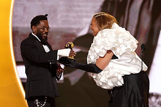 Kendrick Lamar accepts the Best Rap Album award for “GNX” from Queen Latifah onstage during the 68th GRAMMY Awards at Crypto.com Arena on February 01, 2026 in Los Angeles, California.