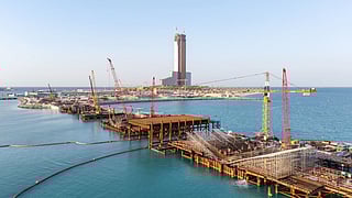 Construction progresses on Wynn Bridge, the 548-metre link connecting Wynn Al Marjan Island to Dubai and the UAE’s main road network ahead of the resort’s 2027 opening.