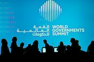 Delegates arrive at the plenary hall to attend the World Governments Summit in Dubai on February 3, 2026.