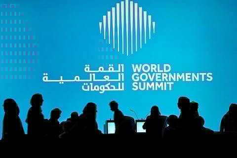 Delegates arrive at the plenary hall to attend the World Governments Summit in Dubai on February 3, 2026.