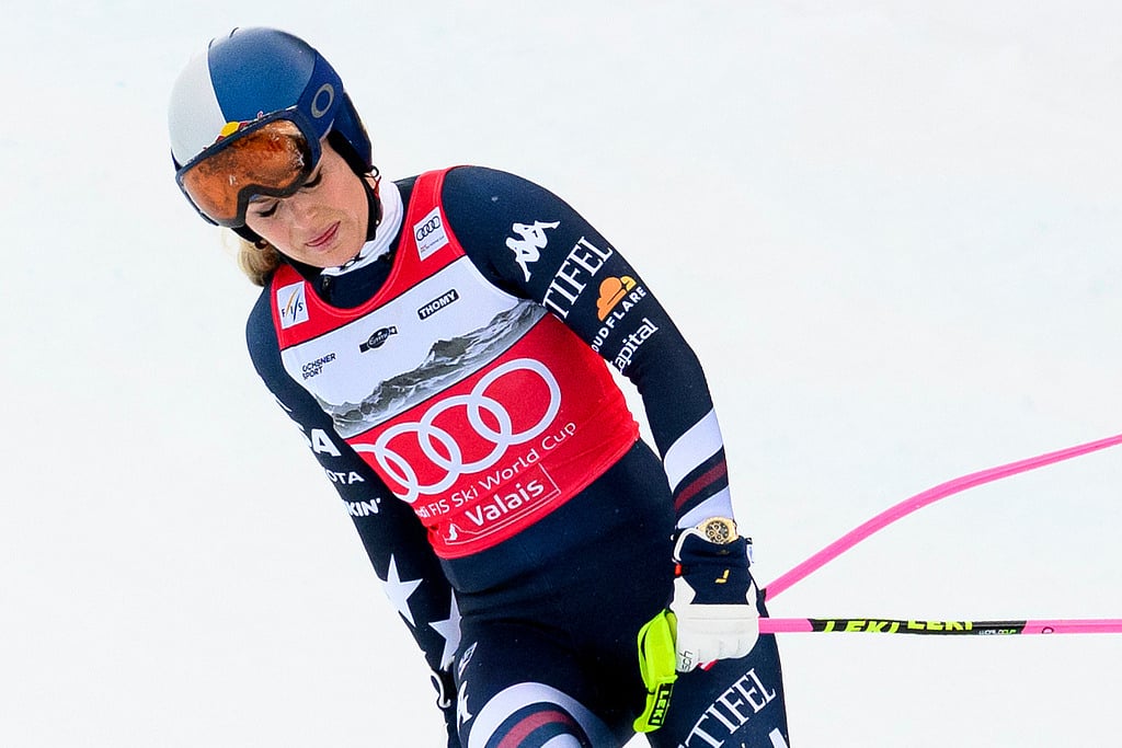 United States' Lindsey Vonn approaches the finish area after crashing, during an alpine ski, women's World Cup downhill, in Crans Montana, Switzerland, Friday, Jan. 30, 2026.