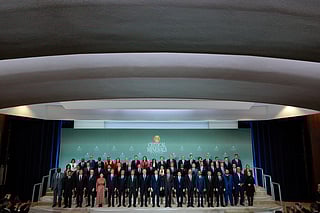 Secretary of State Marco Rubio (C) poses for a "family photo" with the 55 government officials who were invited to the first Critical Minerals Ministerial in the Dean Acheson Auditorium at the State Department's Harry S. Truman Building on February 04, 2026 in Washington, DC. About 50 countries attended the ministerial, a gathering to discuss the creation of tech supply chain partnerships that can bypass China.